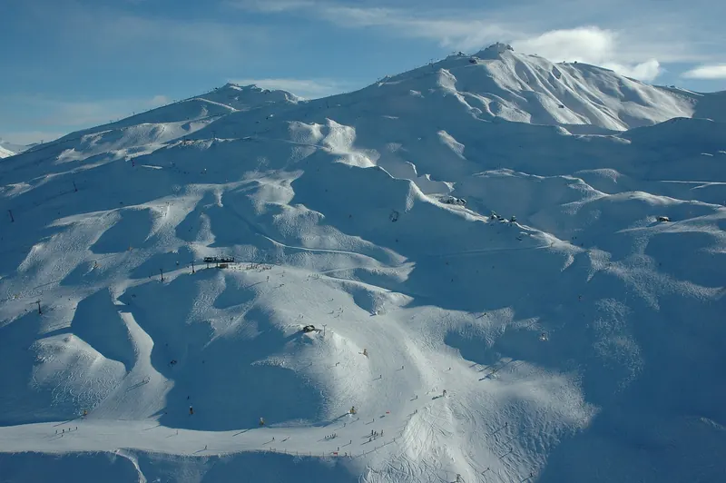 Skiers on the slopes of Coronet Peak near Queenstown