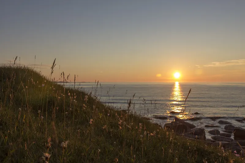 The midnight sun over the Lofoten Islands in summer