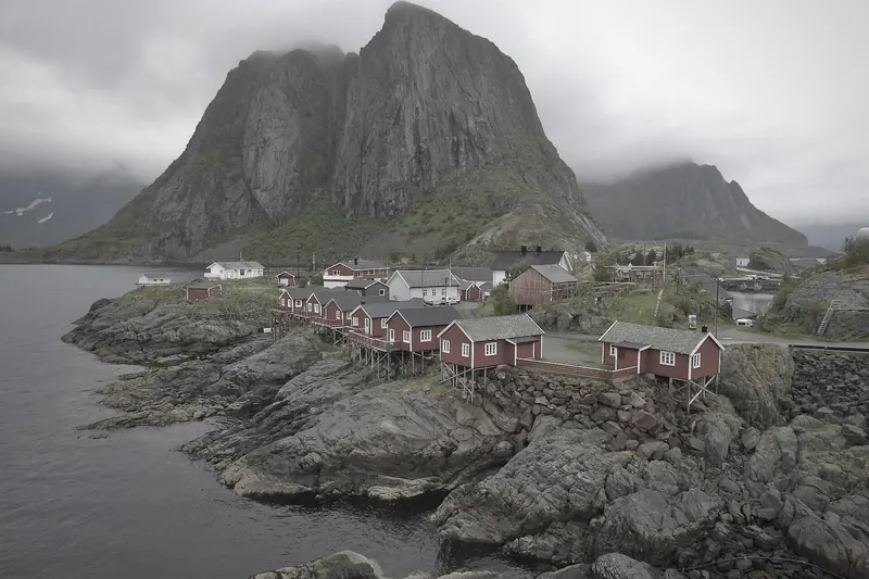 The red fishing cabins of Hamnøy against the Lofoten peaks