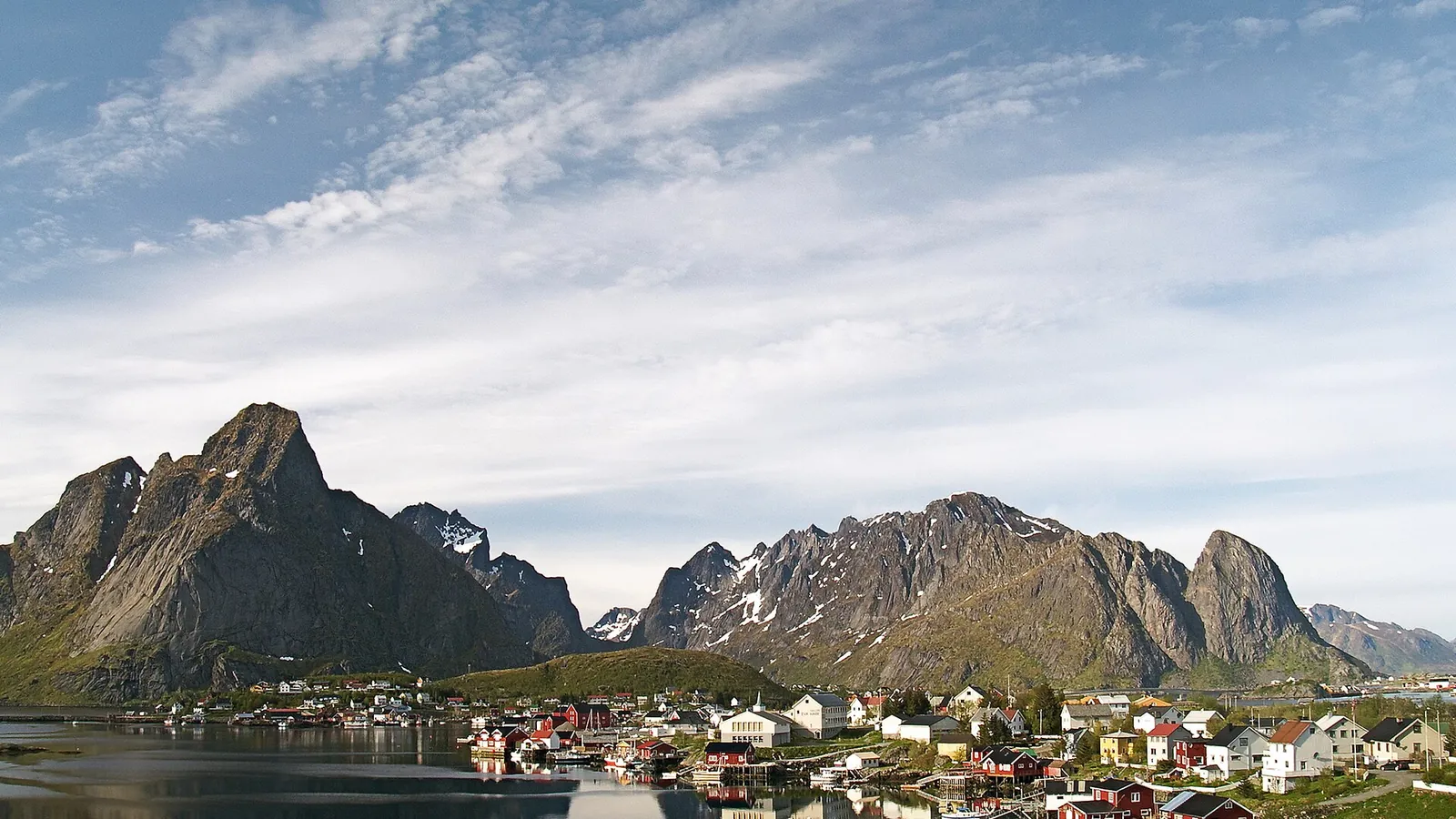 The fishing village of Reine beneath jagged peaks in the Lofoten Islands