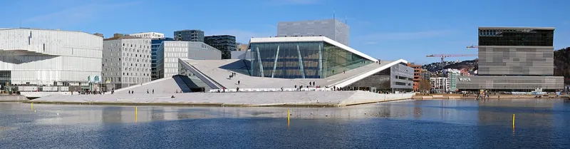 The Oslo Opera House rising from the harbour like a sheet of ice
