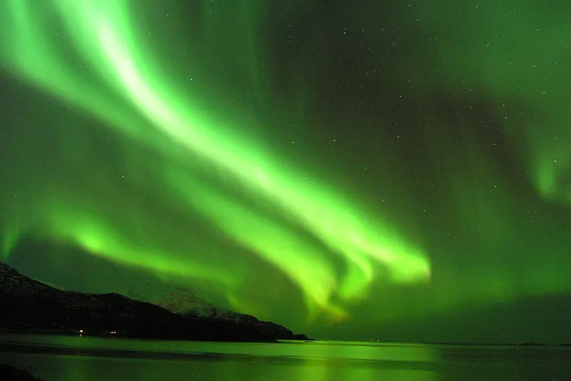 The aurora borealis glowing over Tromsø