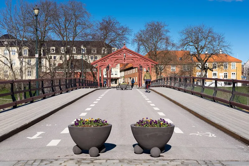 The Old Town Bridge over the Nidelva river at golden hour
