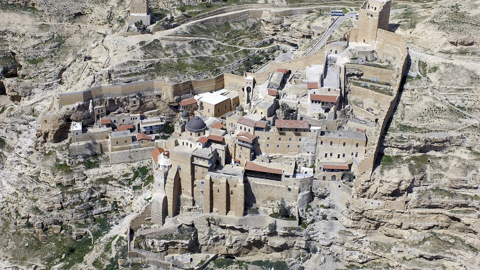 Aerial view of Mar Saba Monastery built into the Kidron Valley cliff