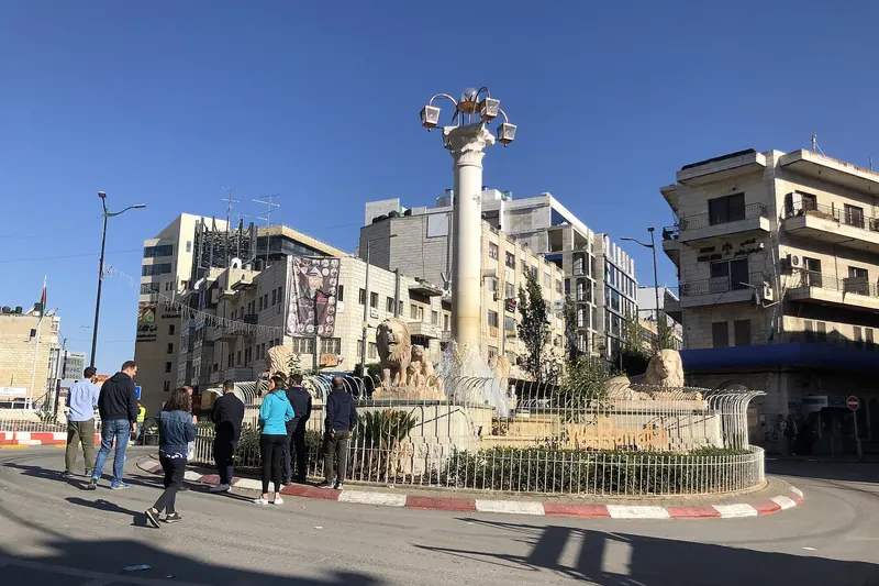 Al-Manara Square in the centre of Ramallah with its stone lions and busy traffic