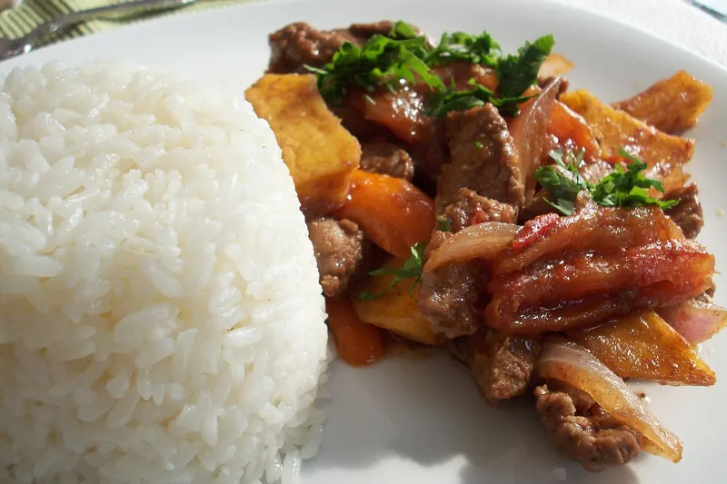 Lomo saltado, a Peruvian stir-fry of beef, onions and fries