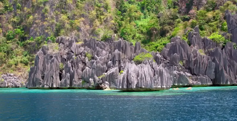 Limestone rocks rising from the sea near Coron Island