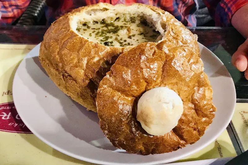 Żurek sour rye soup served in a bread bowl
