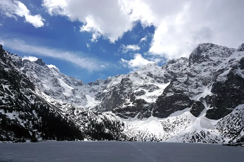 The lake Morskie Oko with the Tatra peaks reflected in its water