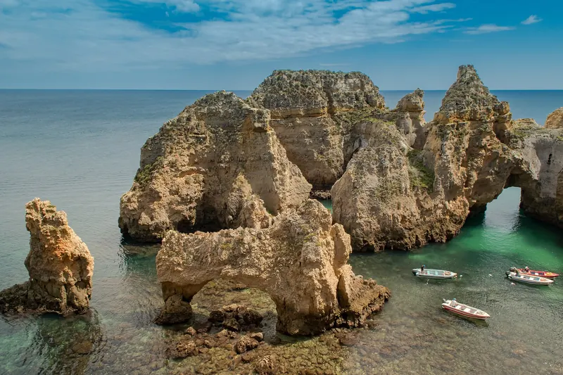 The ochre limestone cliffs and sea stacks of Ponta da Piedade near Lagos