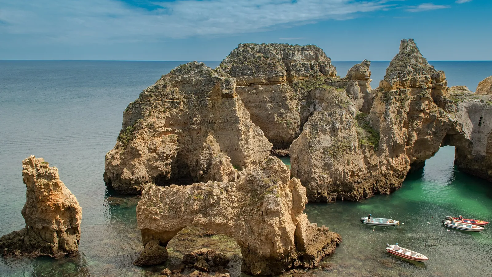 The ochre limestone cliffs and sea stacks of Ponta da Piedade near Lagos