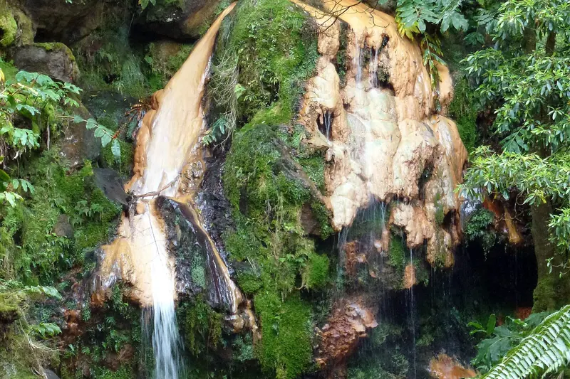 The thermal waterfall and pool at Caldeira Velha on the flank of the Fogo volcano