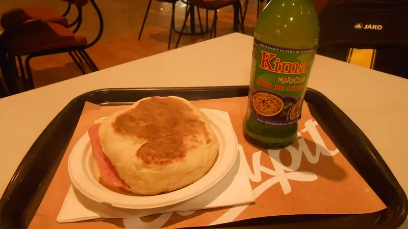 Bolo lêvedo, a soft griddle-cooked Azorean bread, split and buttered