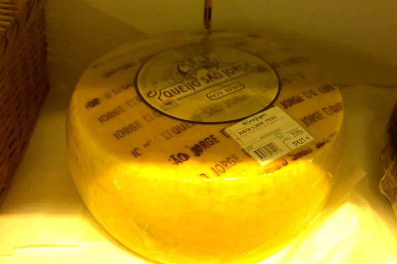 A whole wheel of Queijo São Jorge, a firm cow's milk cheese from the Azores