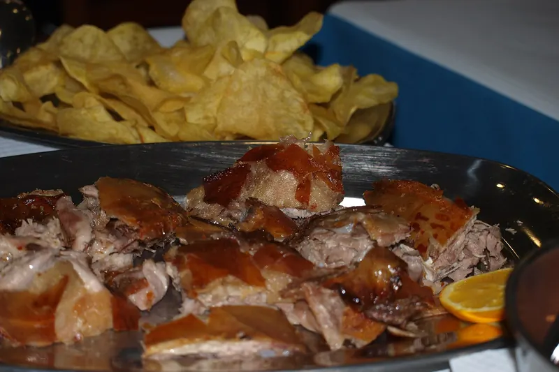 Leitão da Bairrada, whole roast suckling pig with crackling skin