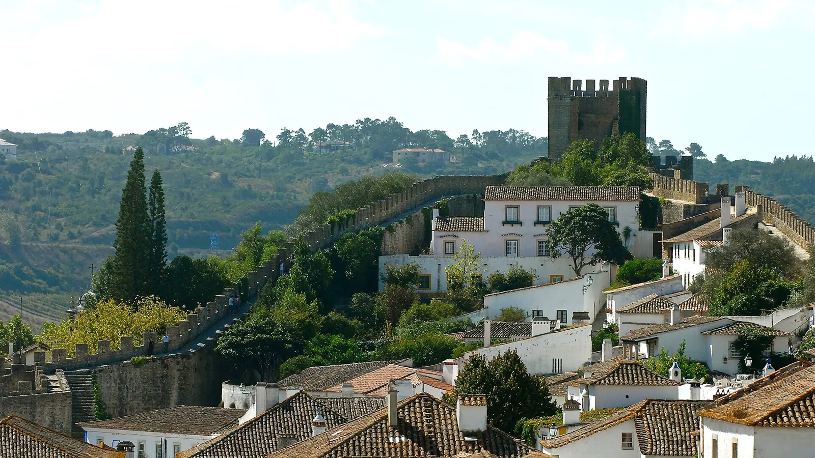 Óbidos's medieval castle walls surrounding the whitewashed old town