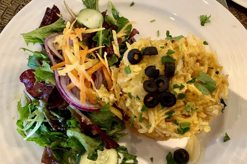 Bacalhau à Brás, a Portuguese salt cod dish with eggs and shoestring potatoes