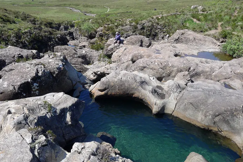 The crystal-clear Fairy Pools beneath the Cuillin on Skye