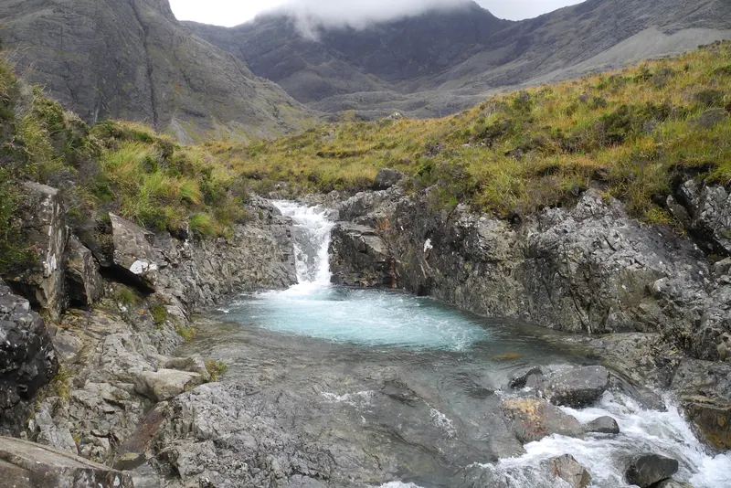 The clear waters of the Fairy Pools on Skye