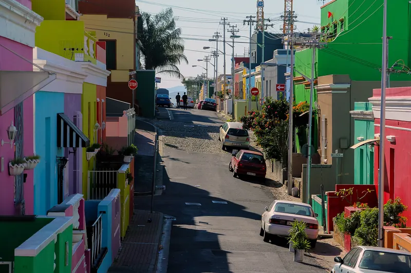 Brightly painted houses along a steep cobbled street in Bo-Kaap