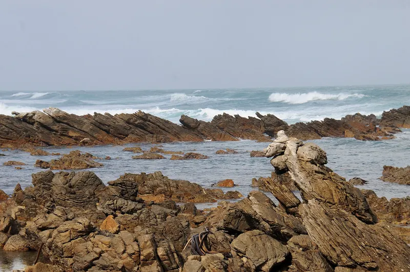 The rocky shoreline at Cape Agulhas, the southernmost point of Africa