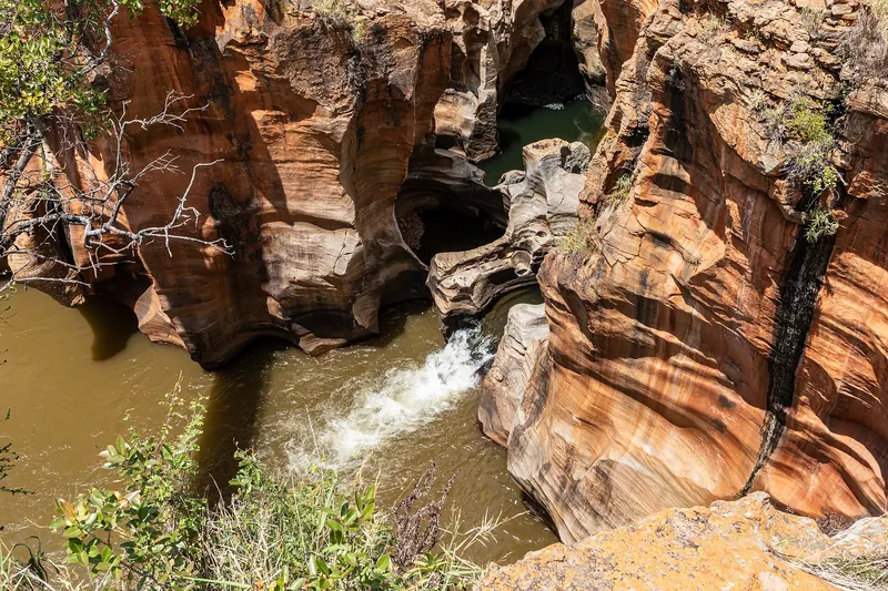 The cylindrical potholes of Bourke's Luck worn into the rock by the Treur and Blyde rivers