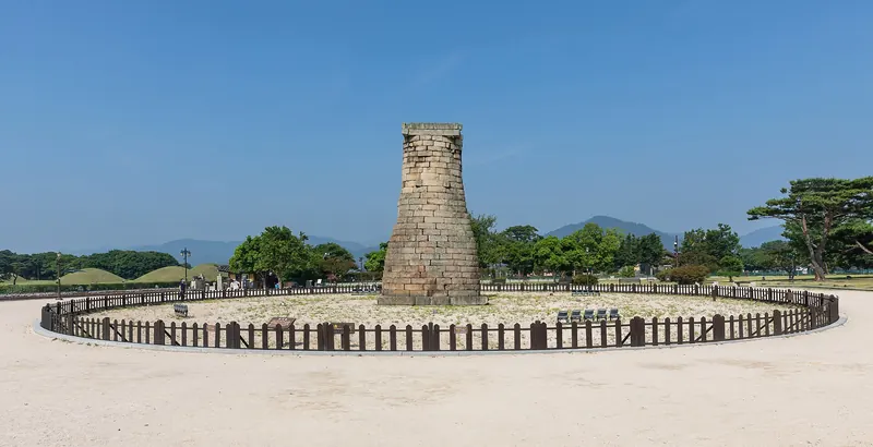 The stone bottle-shaped Cheomseongdae observatory under a blue sky