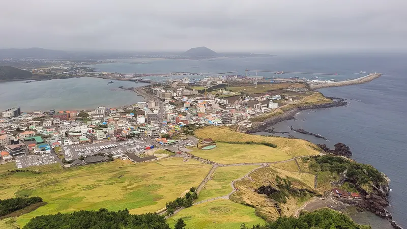 The Seongsan Ilchulbong tuff cone rising from the sea on Jeju Island