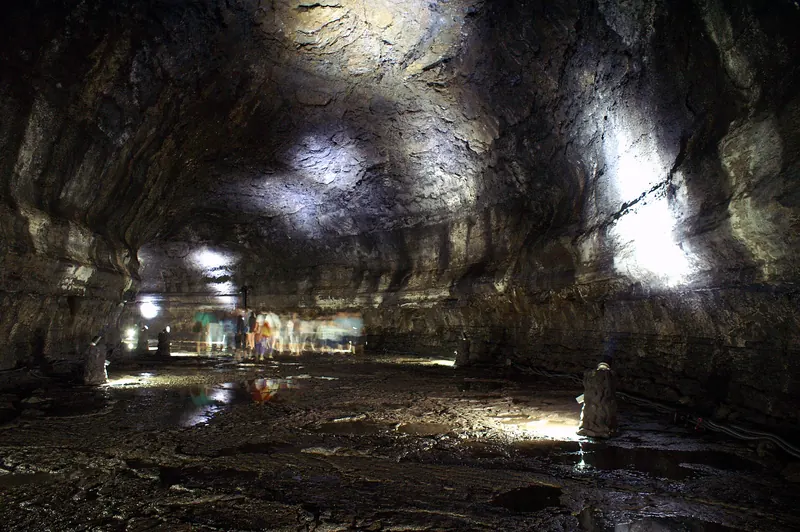 The dark interior of Manjanggul Lava Tube on Jeju