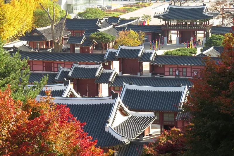 Haenggung Palace in autumn with red and gold leaves