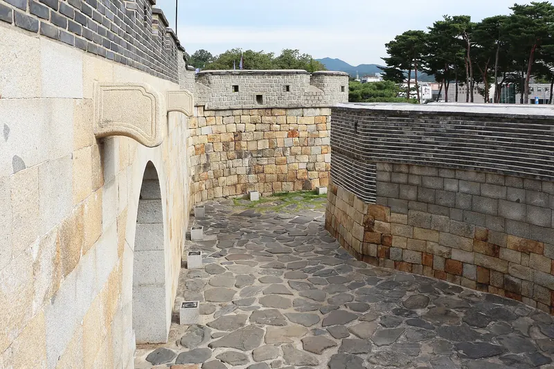 The stone walls and gate of Hwaseong Fortress in Suwon