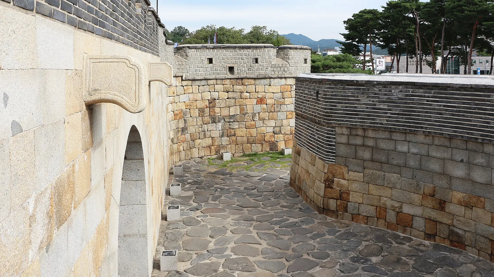 The stone walls and gate of Hwaseong Fortress in Suwon