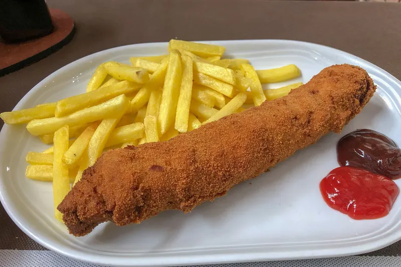 Flamenquín — breaded and fried rolled pork loin with ham