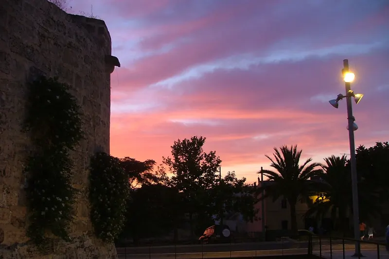 The medieval walls of Alcúdia at sunset
