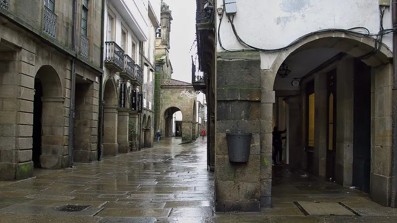 An arcaded granite street in Santiago's old town