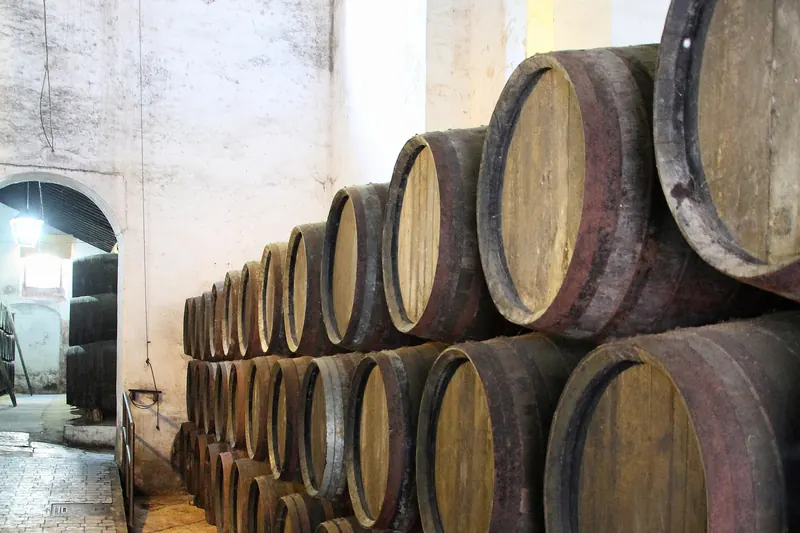 Sherry casks stacked in a bodega at Sanlúcar