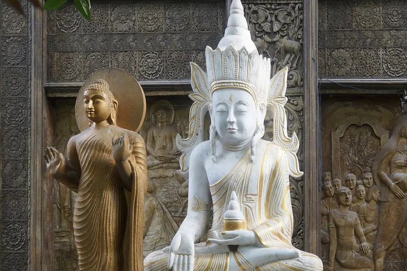 Buddha statues and ornate decorations at Gangaramaya Temple in Colombo