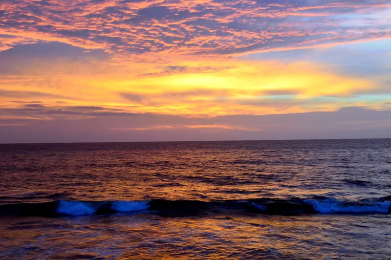 Sunset over the sea at Galle Face Green in Colombo