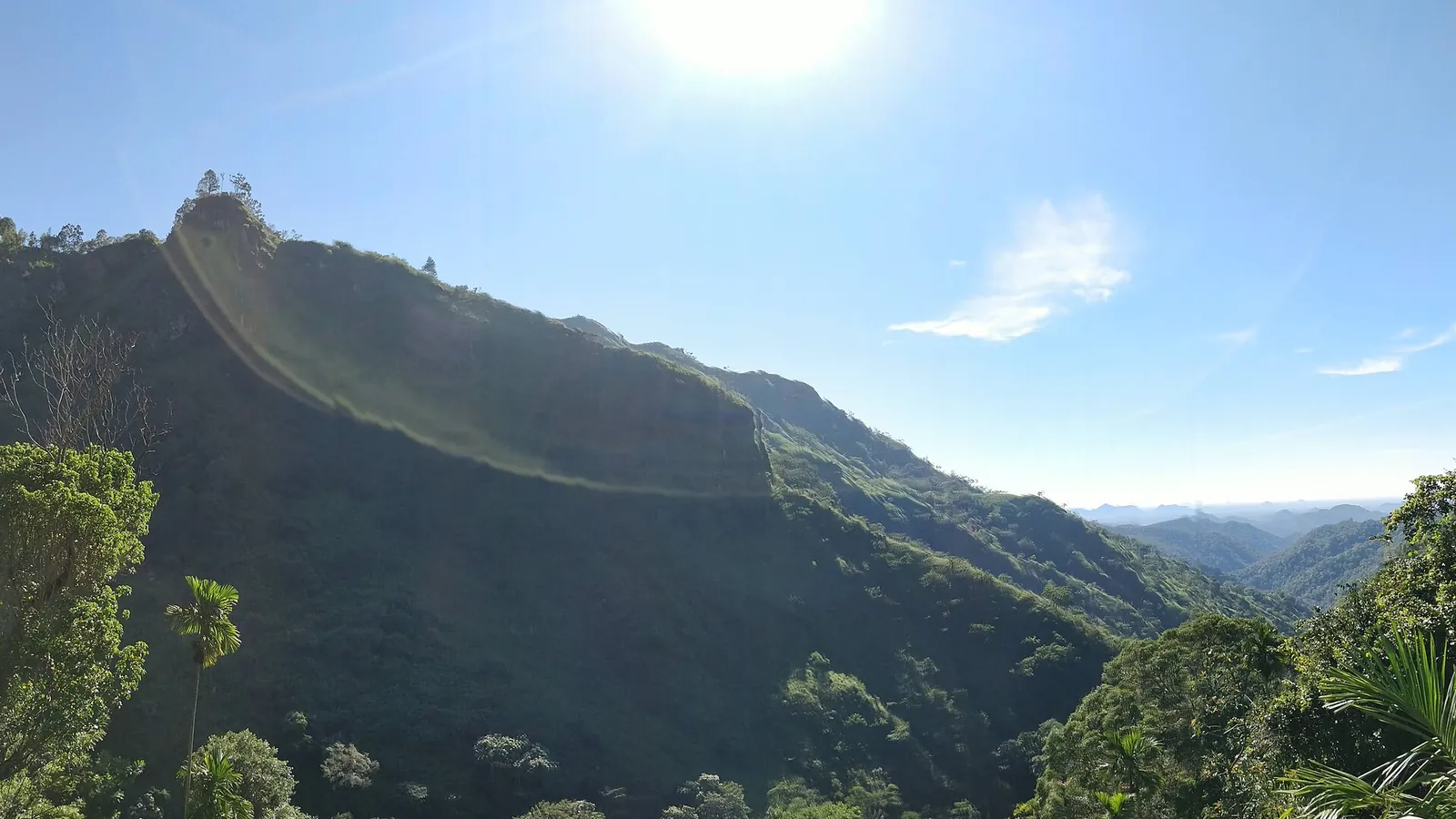 The view over the Ella Gap with green hills and morning mist