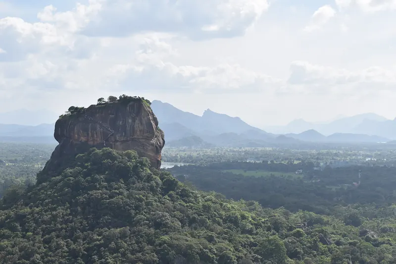Sigiriya Rock seen from the summit of Pidurangala Rock at sunrise