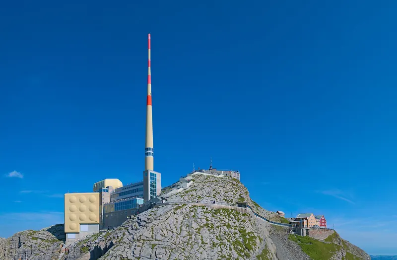 The Säntis summit station on a rocky peak in the Alpstein