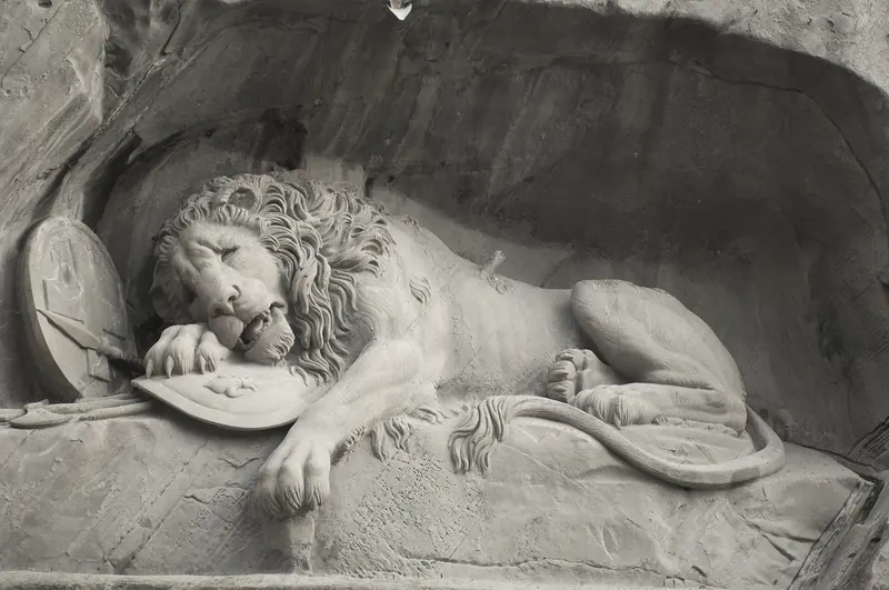 The Lion Monument carved into a rock face in Lucerne