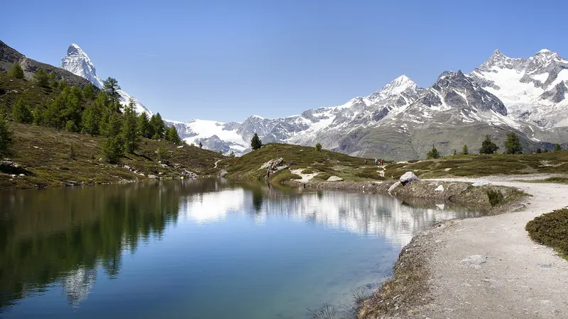 The Matterhorn's reflection in a still Alpine lake near Zermatt