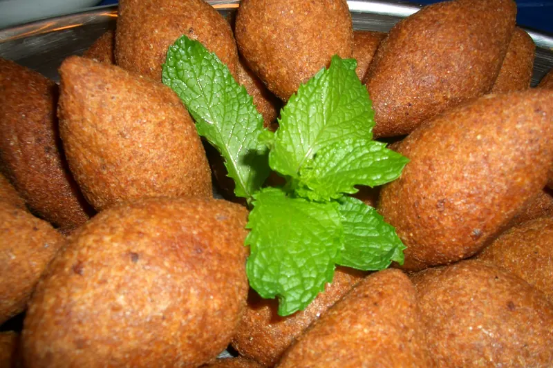Fried kibbeh, torpedo-shaped croquettes of bulgur and minced meat