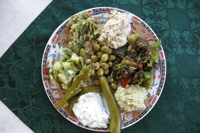 A spread of Arabic mezze dishes on a table