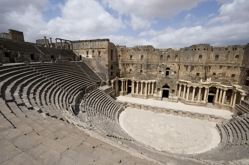 The tiered seating of the Roman theatre at Bosra, photographed in 2009, before the war