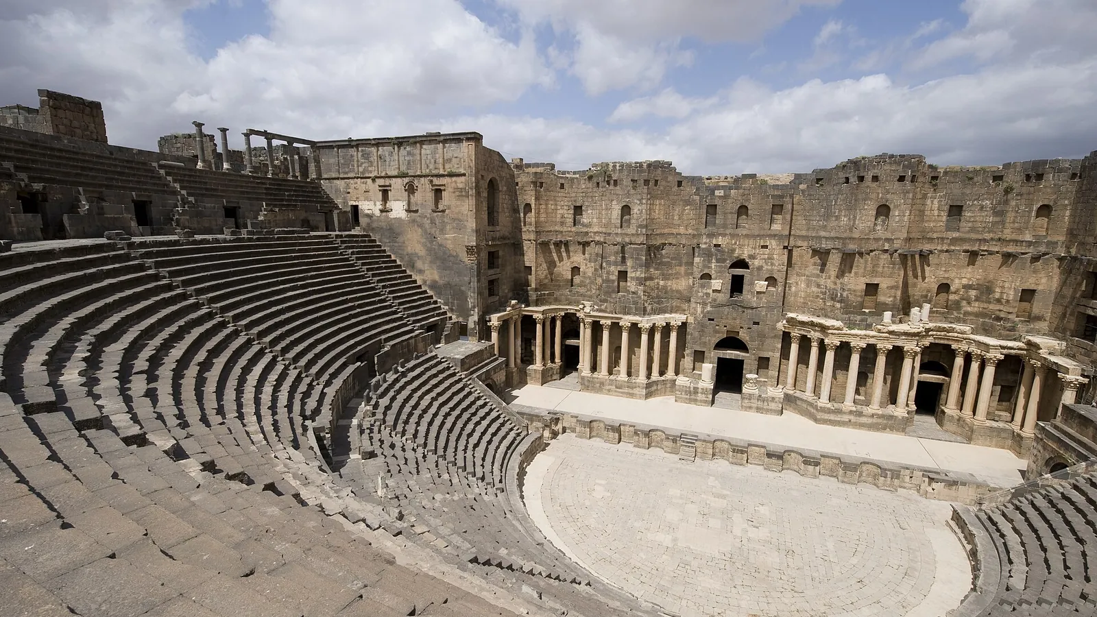 The tiered seating of the Roman theatre at Bosra, photographed in 2009, before the war