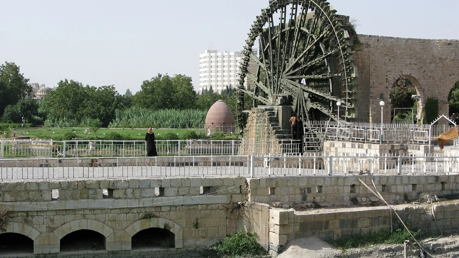 The wooden waterwheels of Hama turning in the Orontes River, photographed in 2008, before the war