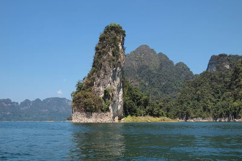 Limestone karsts rising from Cheow Lan Lake in Khao Sok National Park