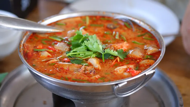 A bowl of tom yum goong, spicy and sour prawn soup